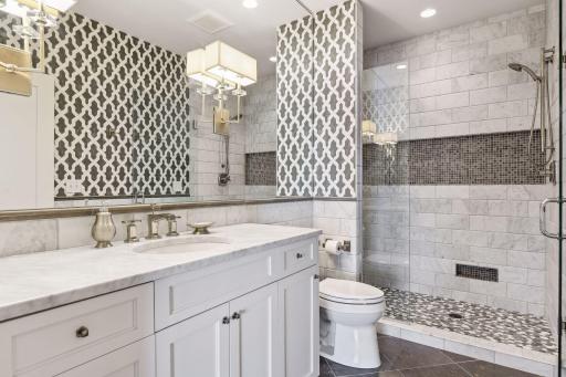 En-suite 3/4 bath with stunning design elements