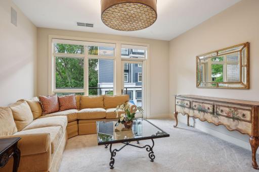 Third bedroom features a walk-in closet and access to a private balcony