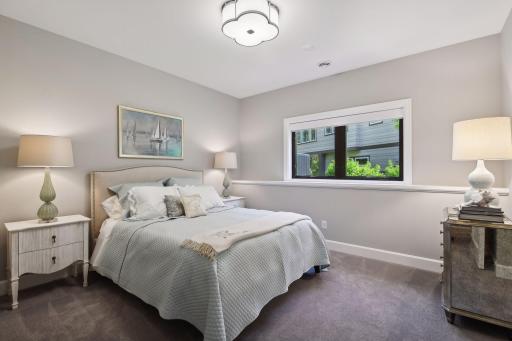 The second Junior Bedroom in the lower level is a private suite with a large walk-in closet.
