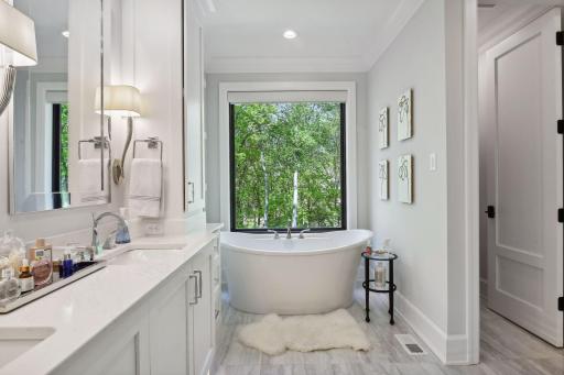 Soak in the free-standing bathtub while you enjoy the private, tree-top views.