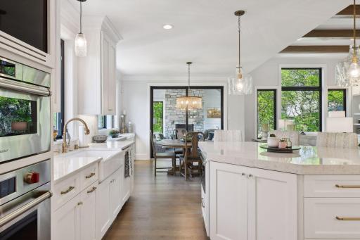 Offering designer fixtures and finishes, the Kitchen is sure to become a favorite gathering place for guests and family alike.