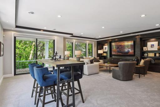 Large windows fill the home with natural light and allow you to enjoy the beauty of this premier location.