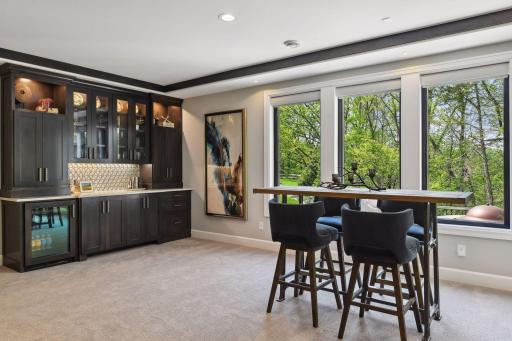 With room for a billiard table, the lower level is the ultimate entertainment space.