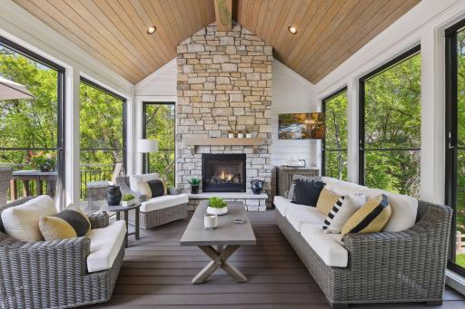 The vaulted Three-Season Porch is one of the ownerâs favorite spaces. With a vaulted ceiling, gas fireplace and Scenix windows, you can enjoy this space even when the weather begins to cool.