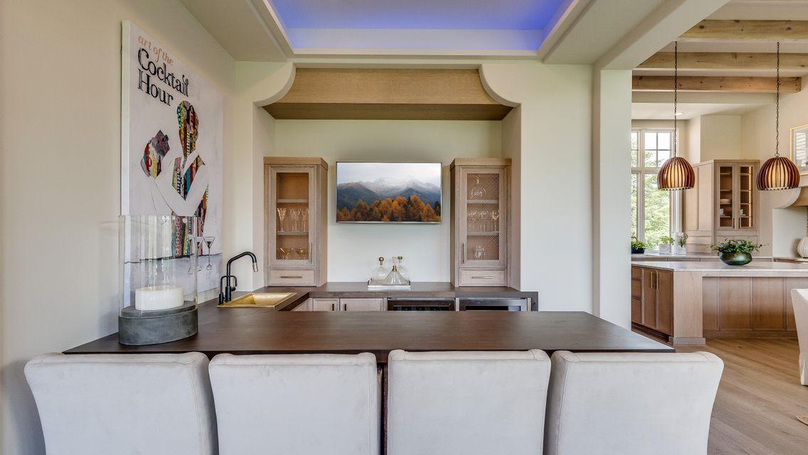 Step Down Main Level Bar with dual refrigerators and ice maker