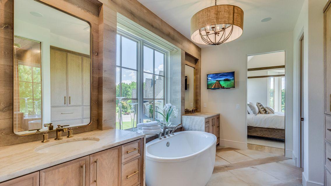 Dual Vanities with waterfalls quartz counter tops