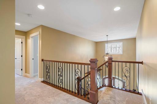 Prepare to be captivated by the grandeur of the 2nd-floor landing, where a majestic staircase serves as the centerpiece of this impressive space. Offering access to 4 bedrooms, this elevated landing exudes elegance and charm at every turn.