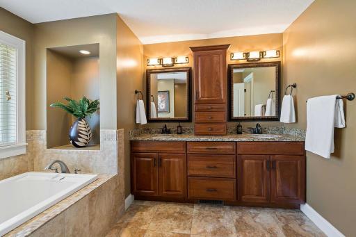 Start your day in style with the convenience of a double sink vanity, offering plenty of space for two to prepare for the day ahead. With its sleek countertops & ample storage this vanity provides the perfect backdrop for your morning routine.