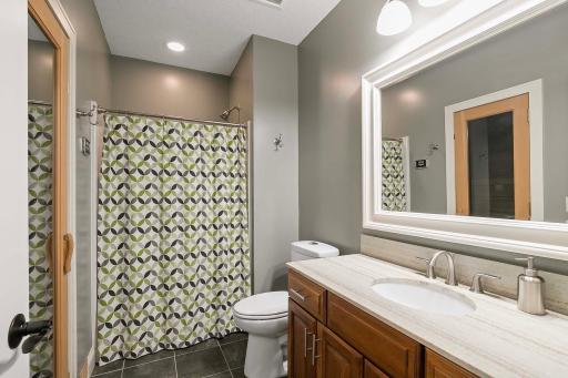 Located in the basement for added privacy and convenience, the 3/4 bath with sauna access offers a secluded retreat away from the hustle and bustle of daily activities.