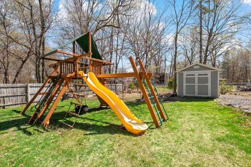 Watch your little ones' imaginations soar as they delight in hours of outdoor play on the included playset. Say goodbye to clutter and hello to organization with the convenient storage shed nestled in the corner of the yard.