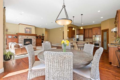 The main floor space features an open-concept layout that fosters a sense of connectivity & flow. Whether you're hosting a dinner party or enjoying a casual meal, this versatile space provides the ideal backdrop for entertaining & everyday living.