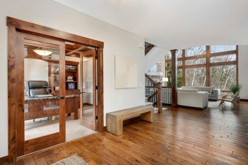 The home office is right off the foyer and features French doors.