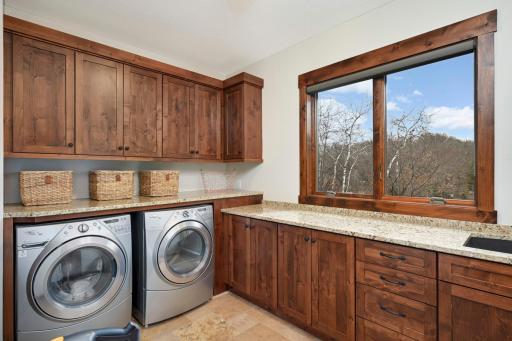 Main level laundry room. There is an additional laundry room in the lower level.