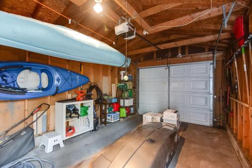 The one-stall garage offers space for a vehicle and storage for equipment and toys.