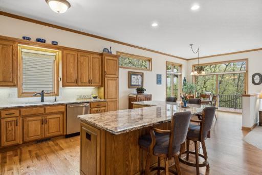 This kitchen was remodeled in 2020 by local builder JB Hoffman Homes. Love the solid oak cabinets & millwork, including crown molding.