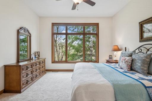 Beautiful windows from this bedroom as well through these XL casement windows with transoms! There is also a ceiling fan/light combo with on/off/speed switch for the fan located on the light switch.