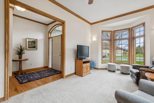 This room also features two sconce lights with a dimmer switch, professionally painted, neutral walls, and upgraded neutral carpet - new in 2020!