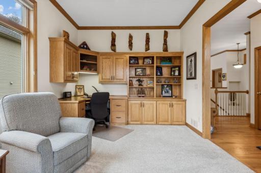 Gorgeous built-in home office desk and cabinet set, built-in ceiling speakers, and convenient ceiling fan/light combo that has a on/off/speed switch conveniently located on the light switch!