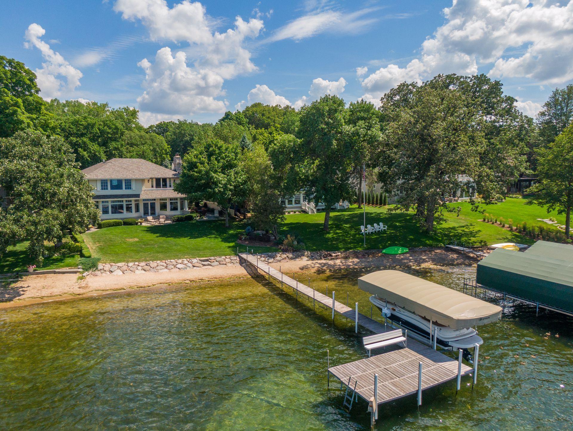 Located on one of the most coveted stretches of lakeshore on all of Lake Minnetonka