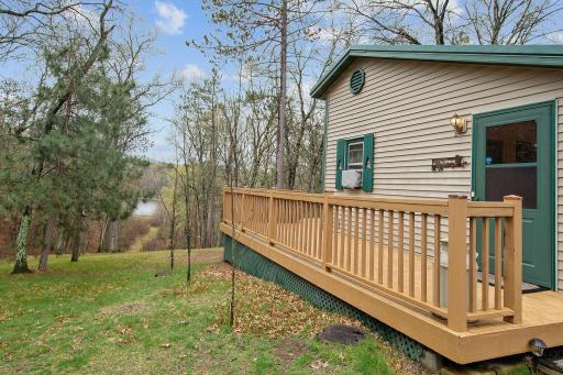 Deck is well-maintained and captures all angles of large property