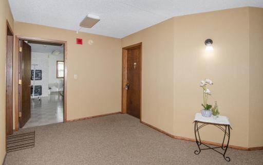 Welcoming and spacious common area with laundry room and storage lockers just steps away.