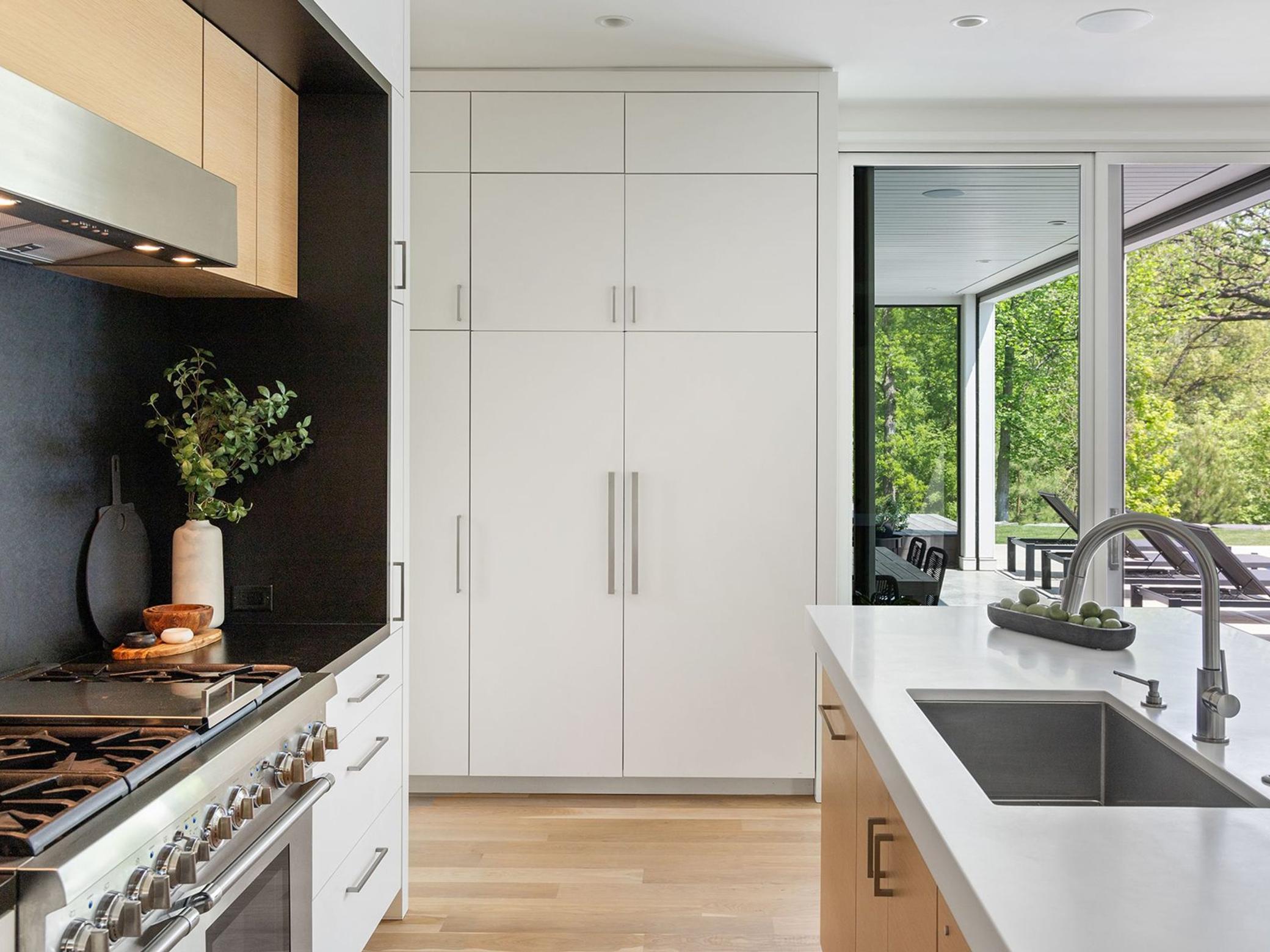 The view from the kitchen to the covered patio.