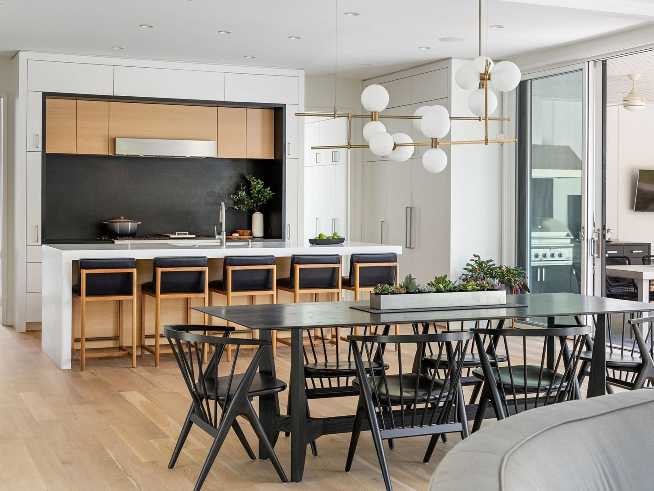 The stunning main living space features an open floor plan with sleek, modern lines.