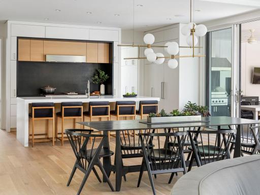 The stunning main living space features an open floor plan with sleek, modern lines.