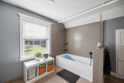 Extra bathtub and sink adjoins the 4th bedroom, easy conversion to add a full bath.