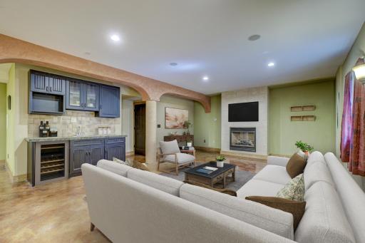 Retreat to the lower level to find an expansive living area, perfect for entertaining guests!