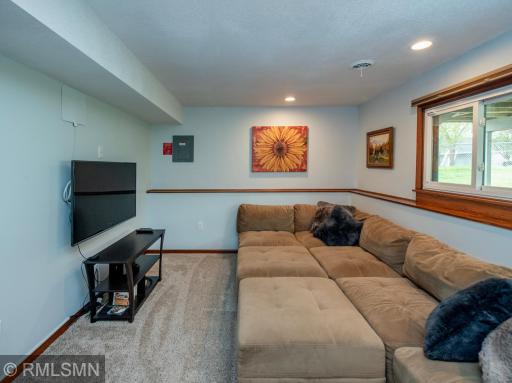 Another great entertainment space or shut the door and keep the basement noise down here!