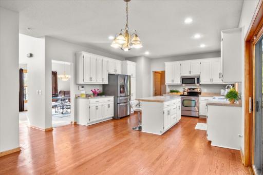 Your kitchen features a center island, a multitude of storage and stainless appliances.