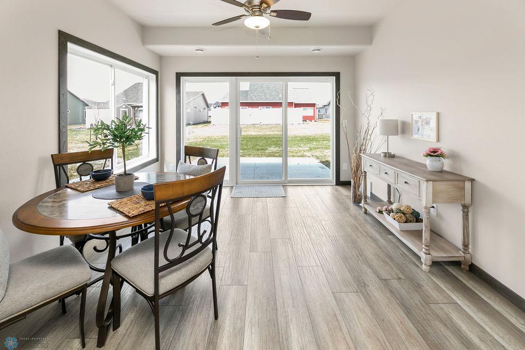 Sunroom with large window and patio doors for more natural light