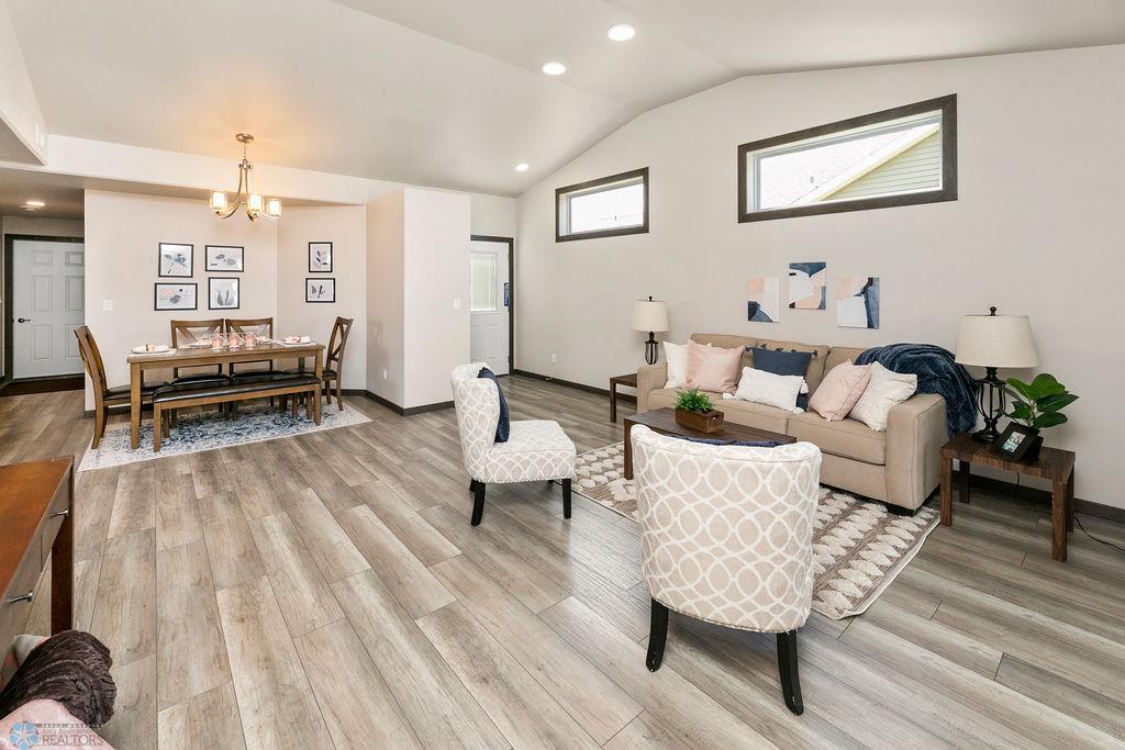 Wood grain flooring throughout living area