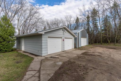2 STALL DETACHED HEATED/INSULATED GARAGE AND POLE BUILDING
