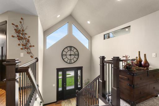 Grand foyer offers a memorable first impression. Stairway width extends over 5 feet wide to both levels.