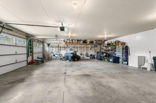 Functional three-car garage with room for storage. Heated space, fully finished 33 x 28.