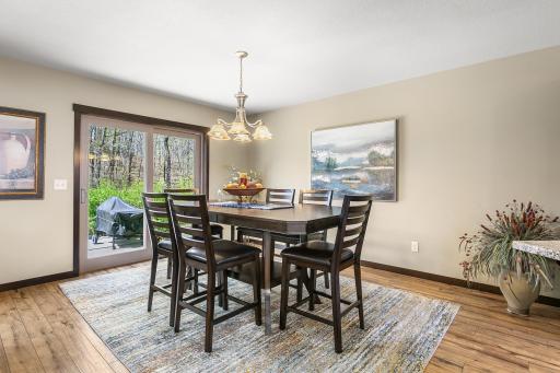 Bright dining area with natural light, with immediate access to the patio with no steps.