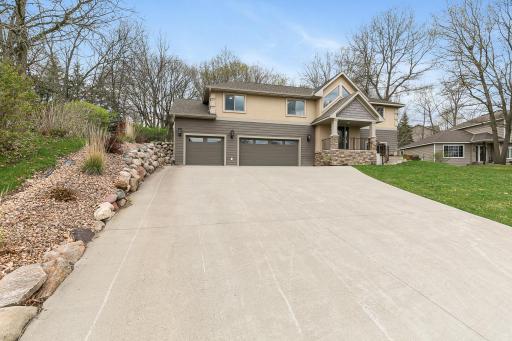 Expansive driveway offers ample parking space.