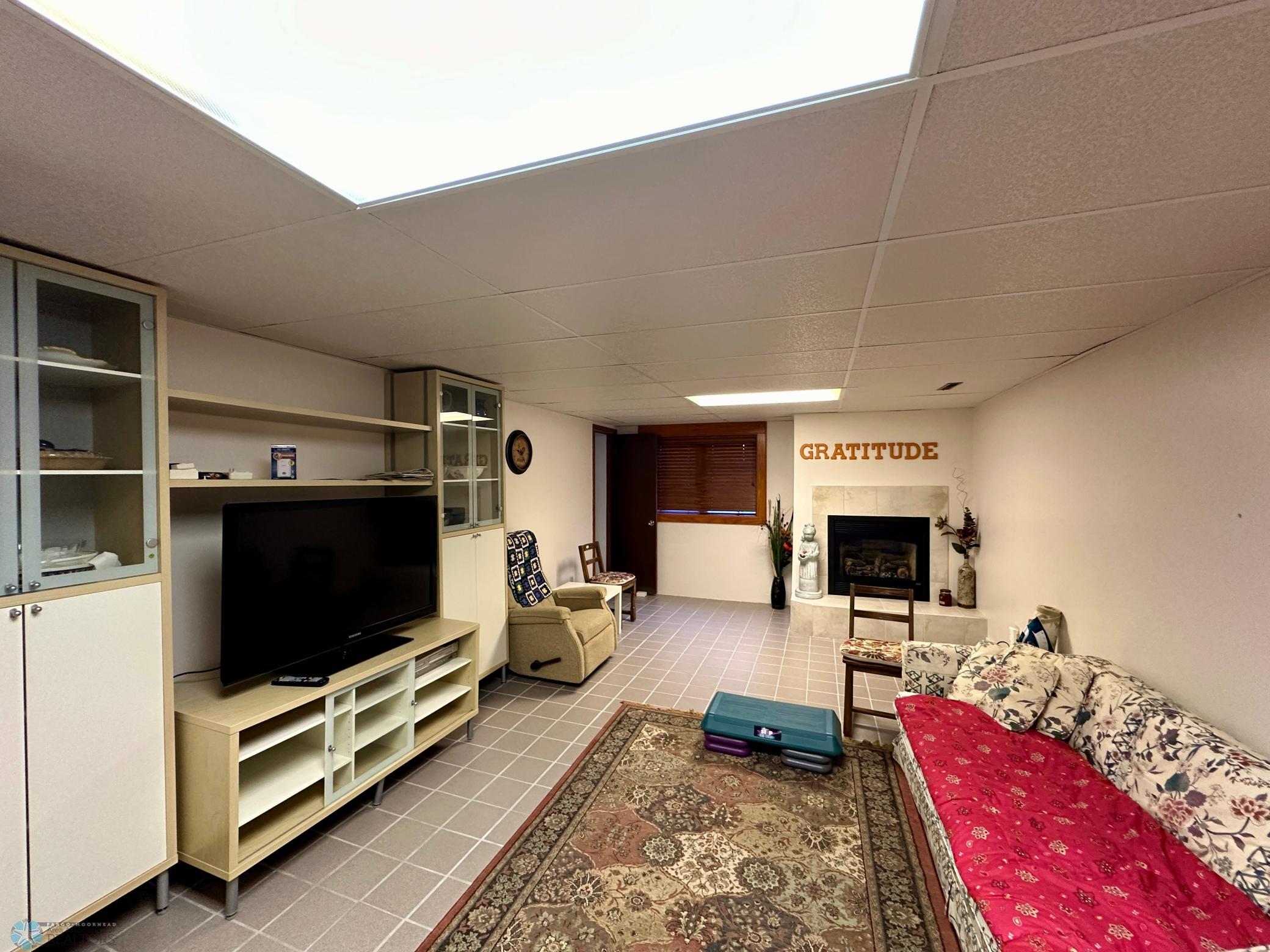 Lower level family room with fp