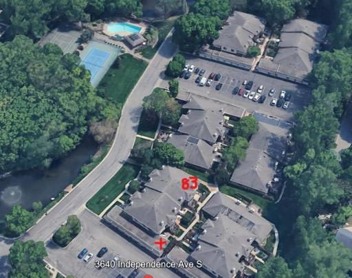 Aerial shows property (83), garage (x) and shared community amenities (pool, tennis/pickleball court, basketball court and dog run)