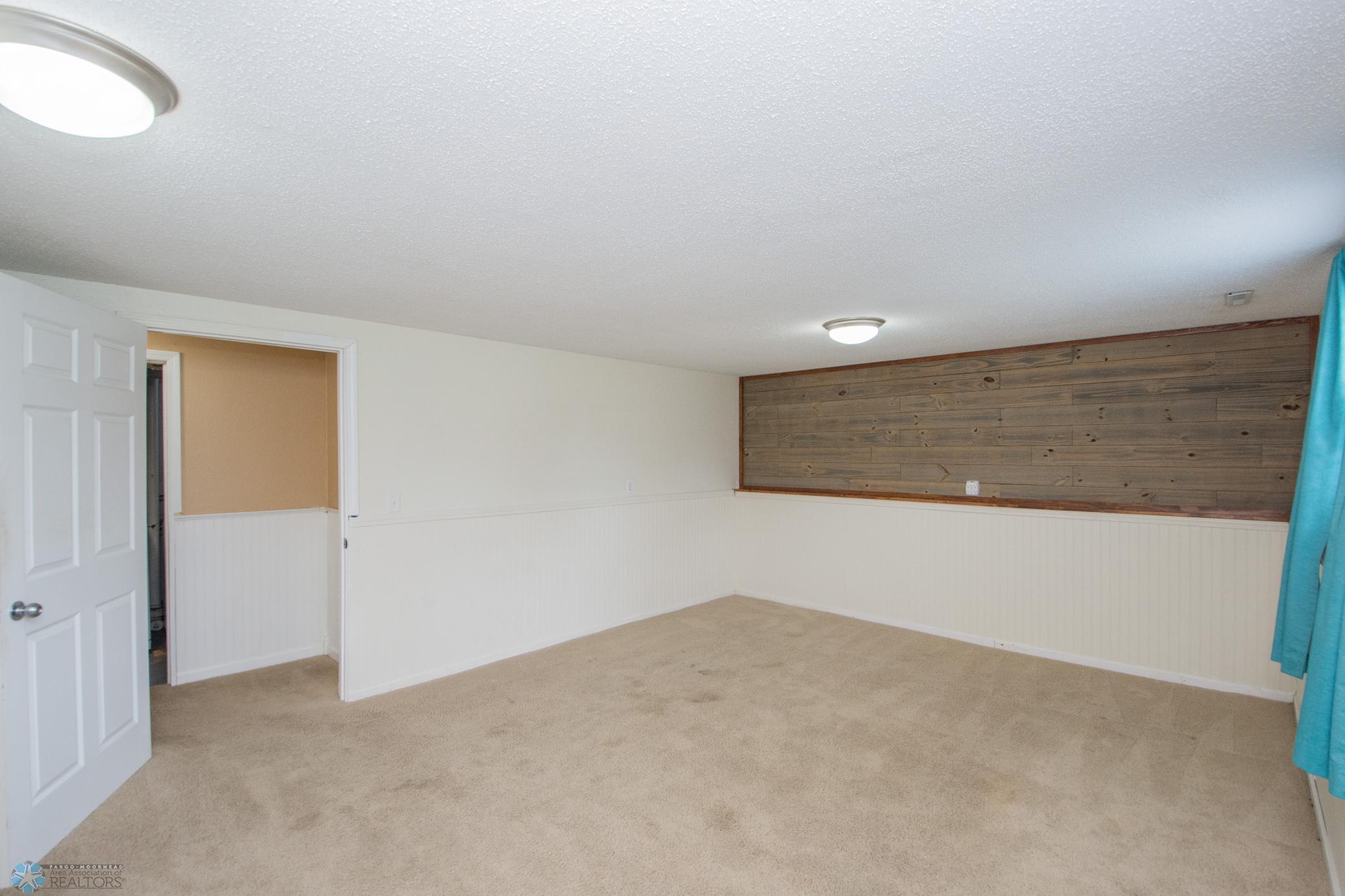 Lower Family Room (most recently was converted to Master Bedroom)