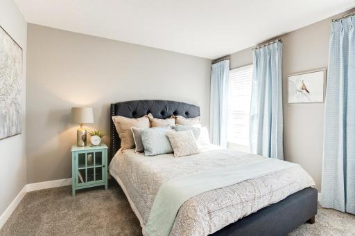Each of the homes secondary bedrooms also offer an abundance of space! Photo of model home. Selections will differ