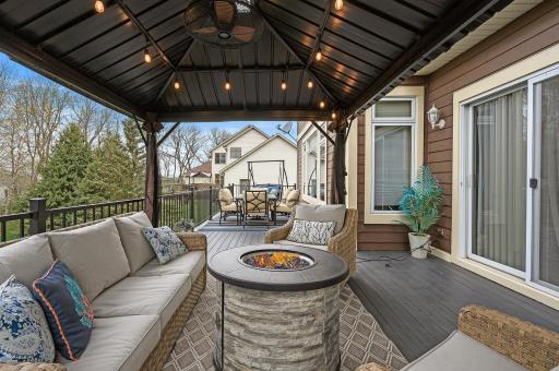 Owners love this gazebo--included with the home--as it adds a sense of privacy and makes this outdoor space feel private!