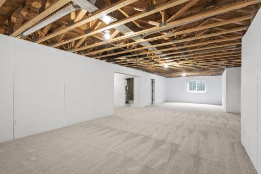 Discover limitless possibilities in the partially finished basement. Already installed sheetrock and carpeting as well as egress window and bathroom rough in, set the stage for an additional 1,500 square feet of living space.