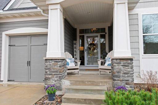 Approaching along charming tree-lined streets, the welcoming front porch invites you in.