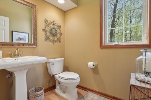 Main level powder room is beautifully appointed.
