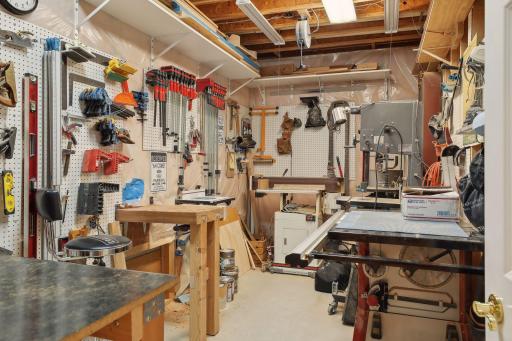 Nice workshop located in basement. Seller will leave the handy peg board.