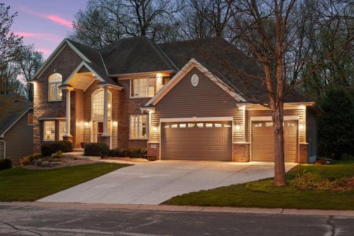 This custom home exudes quality, charm and pride of ownership down to the last detail. Fresh concrete drive, professional landscape and exterior lighting including classy recessed lights add so much.