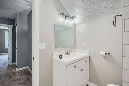 Updated vanity, lighting, and tub/shower!